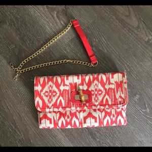 New Chico’s Idra Ikat clutch with chain.
